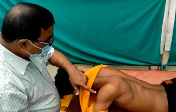 Man suspected to be a CPI-M activist was severely beaten by BJP miscreants in front of Bishalgarh CPI-M party office Man suspected to be a CPI-M activist was severely beaten by BJP miscreants in front of Bishalgarh CPI-M party office
